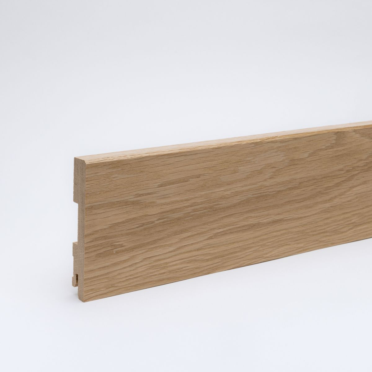 Massivholz-Sockelleiste 100mm gefaste Vorderkante - Eiche gelackt